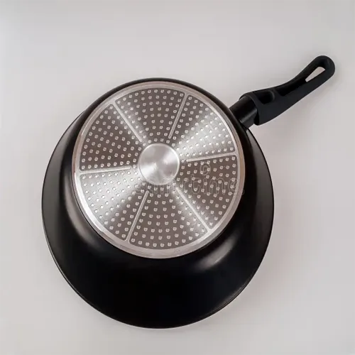 Pan with aluminium-injected base — poor for induction